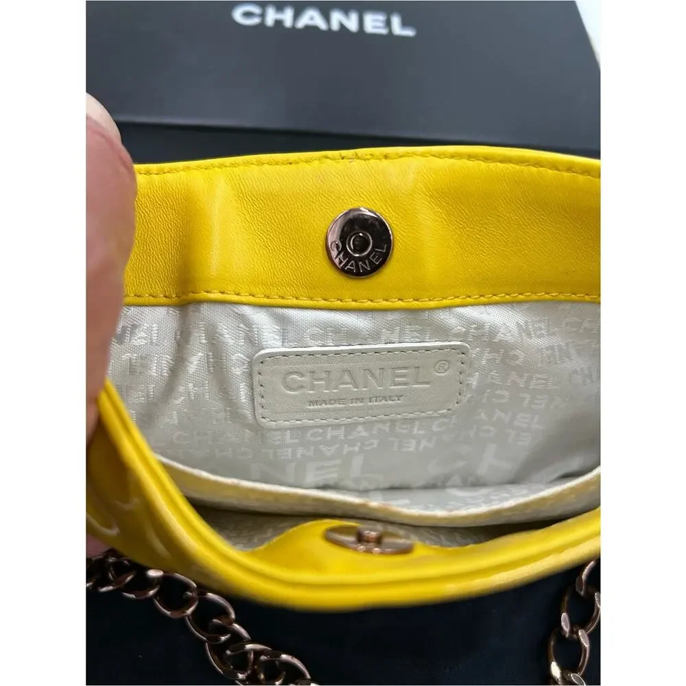 Women's Chanel patent leather floral embossed shoulder bag made in Italy